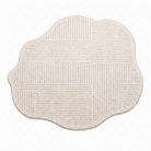 Alcala cream striped rug on a white background