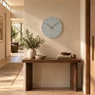 Caravaca Matte Round Silent Wall Clock with Wood Hands for Living Rooms, Grey, in the room