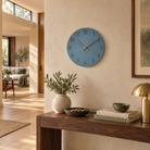 Caravaca Matte Round Silent Wall Clock with Wood Hands for Living Rooms, Slate Blue, in the room